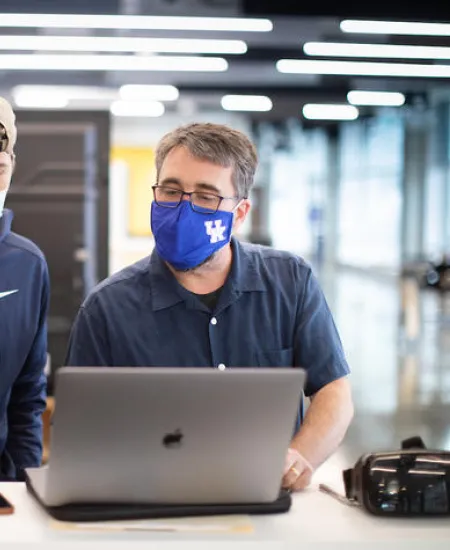 David Stephenson with a student from his VR class. Mark Cornelison | UK Photo.