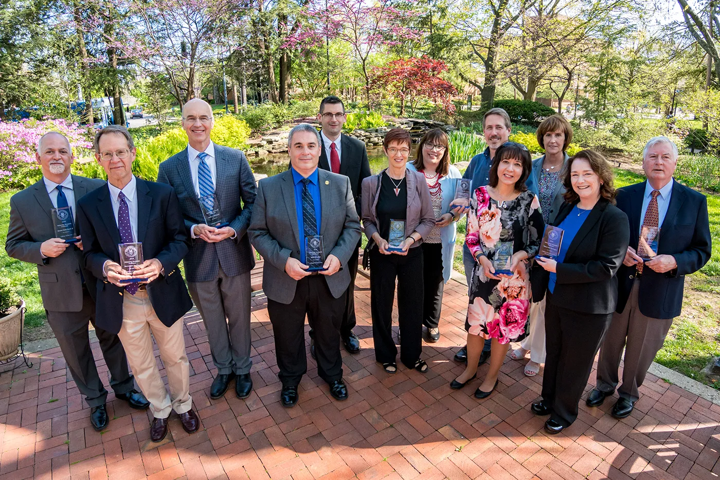 Left to right: Herman Daniel Farrell III, David Van Sanford, Mark Williams, Rick Honaker, Brian Noehren, Heide Gluesing-Luerssen, Heather Bush, Matthew Zook, Jennifer Wilhelm, Sharon Walsh, Nancy Grant Harrington, Richard Ausness.