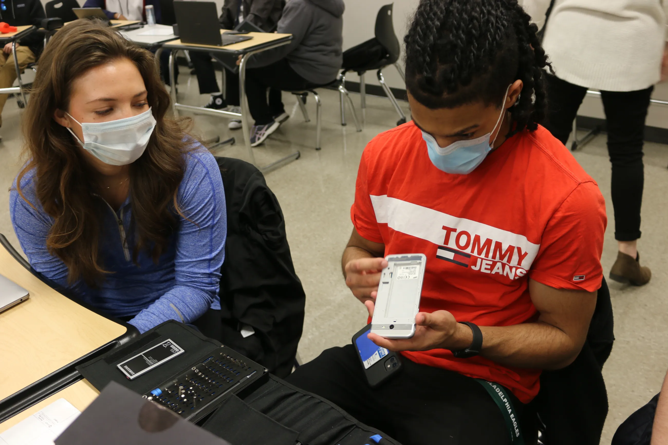 ICT 305 students examine their tech and tools for their partnership with iFixit.