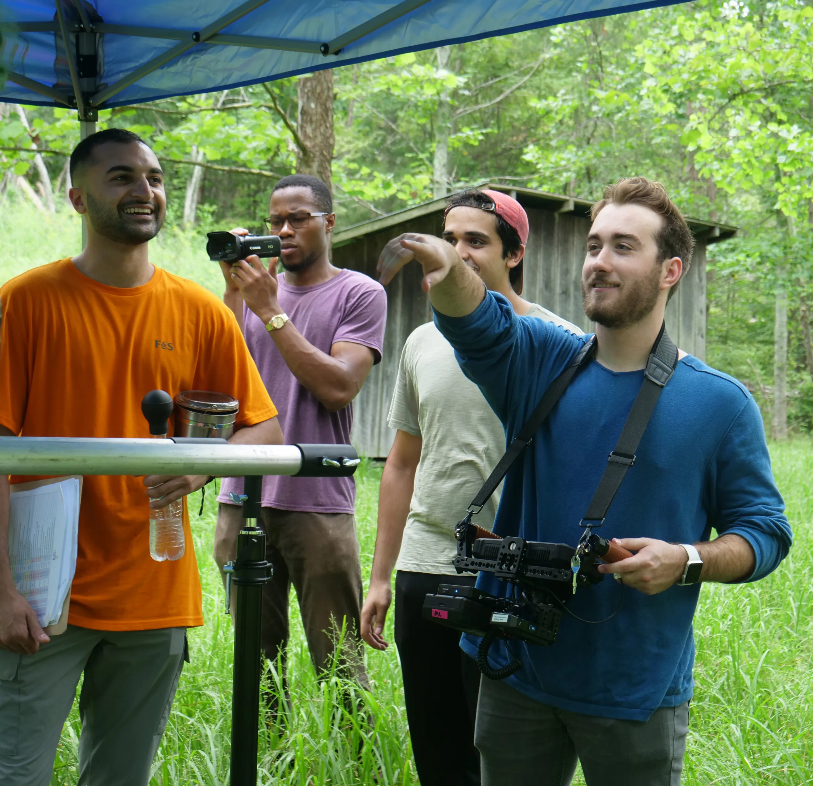 Matthew Dunlap (right) and his crew work on the set of "Burning In Trial" on location in the Red River Gorge.