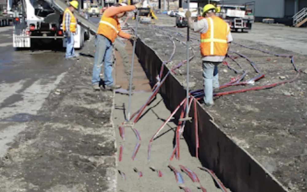 Workers in Washington preparing to place underground electrical lines. (Washington State DOT photo, CC) The federal government's newest round of grants will invest in communities with less than 10,000 people, with projects aimed at lowering residential energy bills and helping smaller communities transition to renewable energy. "The money will help fund 19 projects in Alaska, Oklahoma, Alabama, Maine and elsewhere," reports Will Wright of The Daily Yonder. "The amount of money being pumped into renewable en