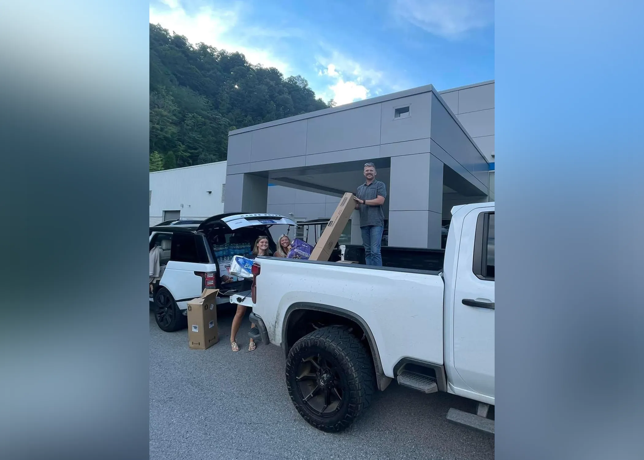 Kassidy Stumbo (left), a CI alumna and current student in the UK J. David Rosenberg College of Law, from Floyd County, delivers loads of food, hygiene products and clothes to various areas in the region.