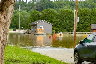 A flooded road in Coventry, Vermont, pop. 1,100, on July 23, 2023. (Adobe Stock photo) 