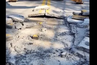 In Lewiston, Maine, a bridge was closed when pavement started to buckle. (WMTM, Maine photo)