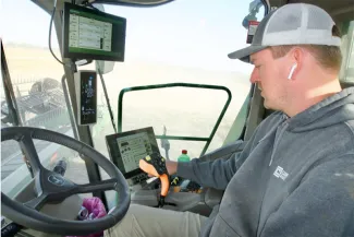 Jack Fehr harvesting organically grown soybeans. (Photo by Keith Schneider, The New Lede)