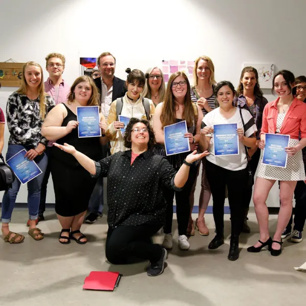 Jessica Burke. First row, l to r: Vanessa Cordero-Liberato, Sarah Caputi, Claire Thompson, Beatriz Ramos-Bouza, Jenna Roseman, Genna Melendez, Cat Kidman. Back: Andrew Maclin, Paul Rogers, Rogers, LeeAnn Paynter, Ember Kawarada, Rowe Moser, Rae Goodwin.