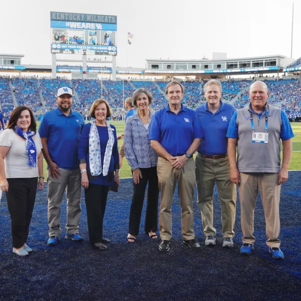 Kroger Field recognition L-R: Jennifer Greer, Julian Vasquez Heilig, Rossetta Sandidge (previous interim Education dean), Mary Davis, Jeffrey Okeson, Derek Lane (previous CI interim dean) and Provost David Blackwell. Mark Cornelison | UK Photo.