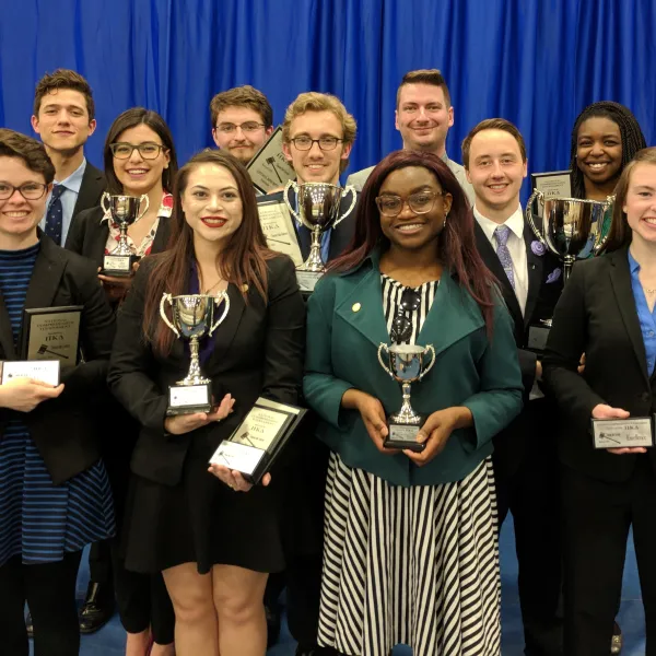 Members of the UK Speech and Debate Team after placing eighth at the Pi Kappa Delta National Comprehensive Tournament.