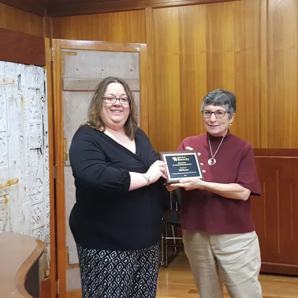 Janice Birdwhistell, right, accepted the College of Communication and Information's award on behalf of TOPSoccer.