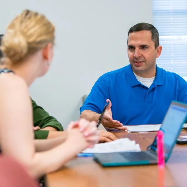 Don Helme discusses with a focus group.