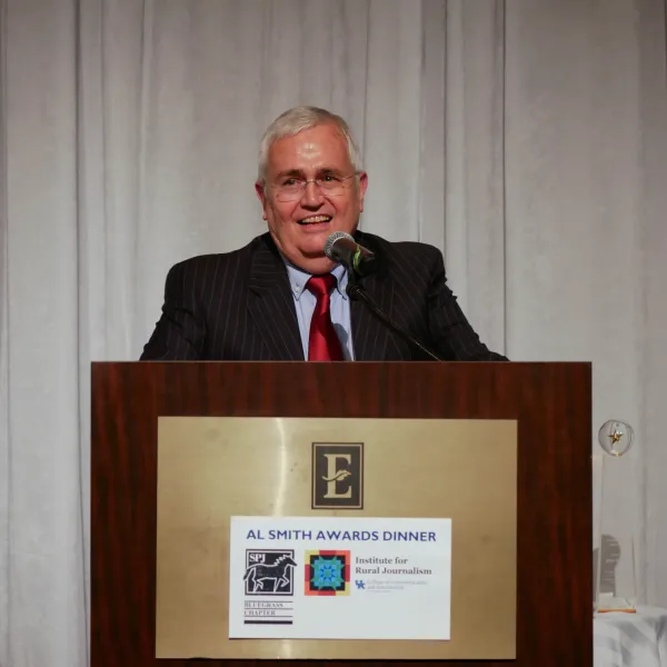 Al Cross speaks at the 2023 Al Smith Awards Dinner. Photo by Sydney Turner.