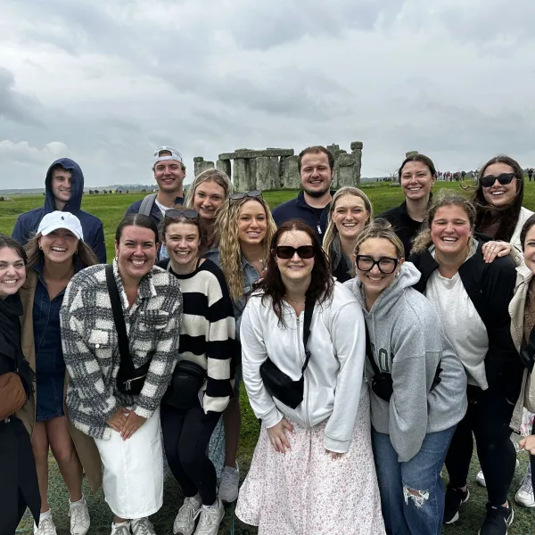 ISC 583 students pose in front of Stonehenge during their education abroad experience in May.