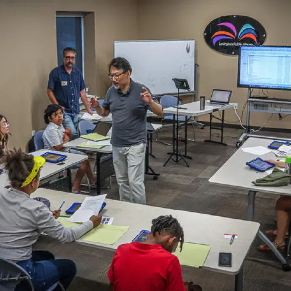 UK Associate Professors Yung Soo Kim and David Stephenson led the workshop, teaching local preteens and teenagers essential multimedia storytelling skills. Photo by Jeremy Midkiff.